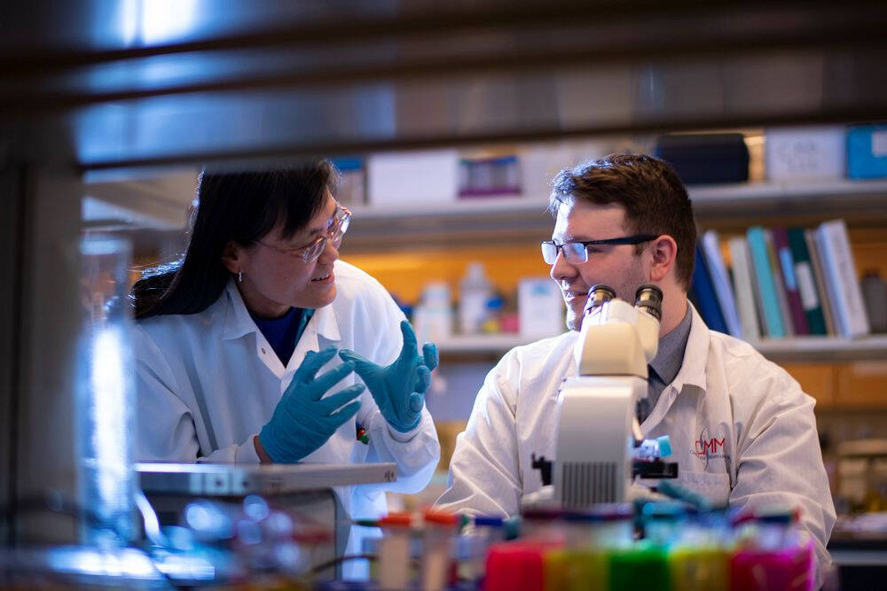 Dr. Khoo and Zane in the lab.